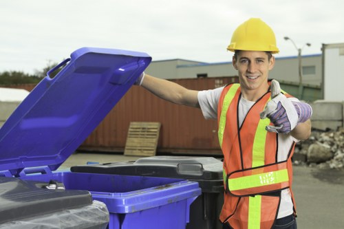 Operators wearing PPE during business waste removal operations
